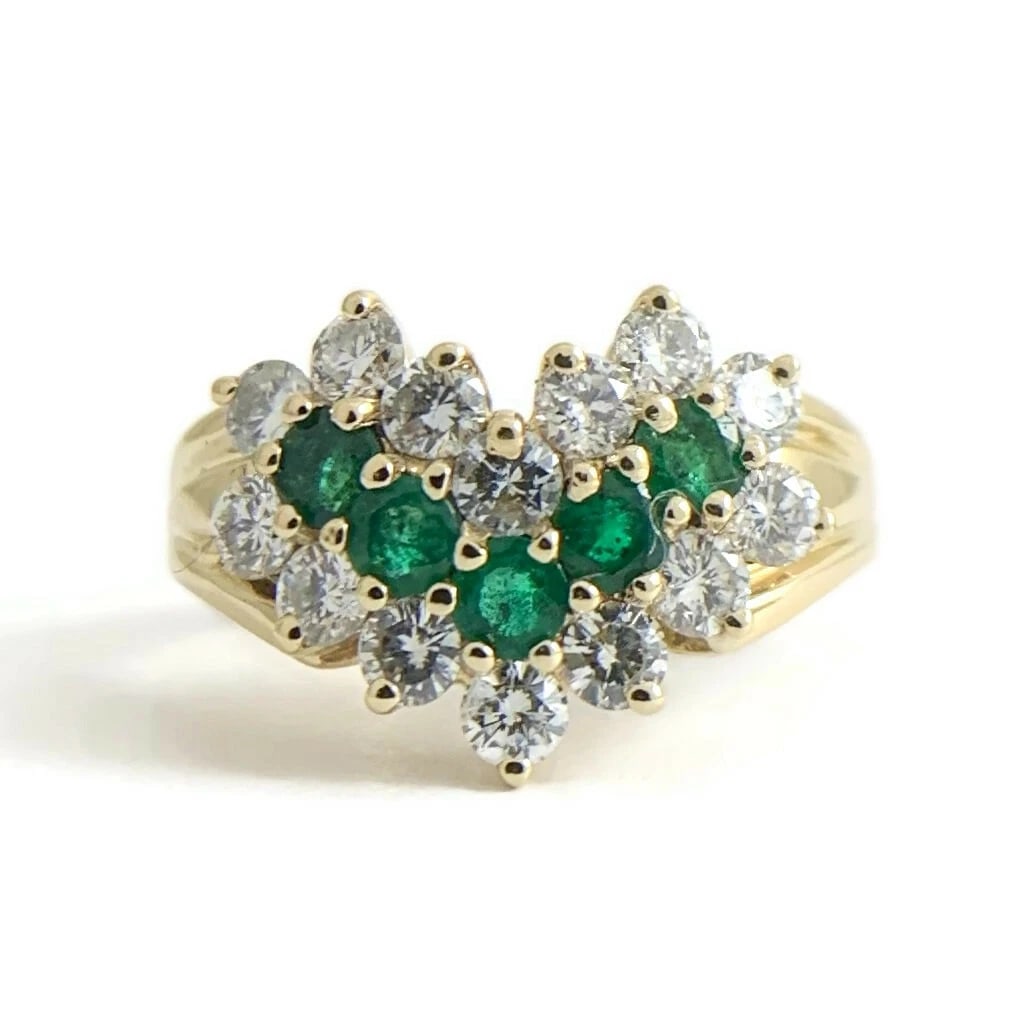 Vintage Green Emerald Diamond Chevron Statement Ring 14K Yellow Gold, 4.77 Grams: Vintage Green Emerald Diamond Chevron Statement Ring 14K Yellow Gold, 4.77 Grams This ring is a beautiful and unique ring! Please let us know if you have any questions. Gemstones: 5 green emeralds, .4