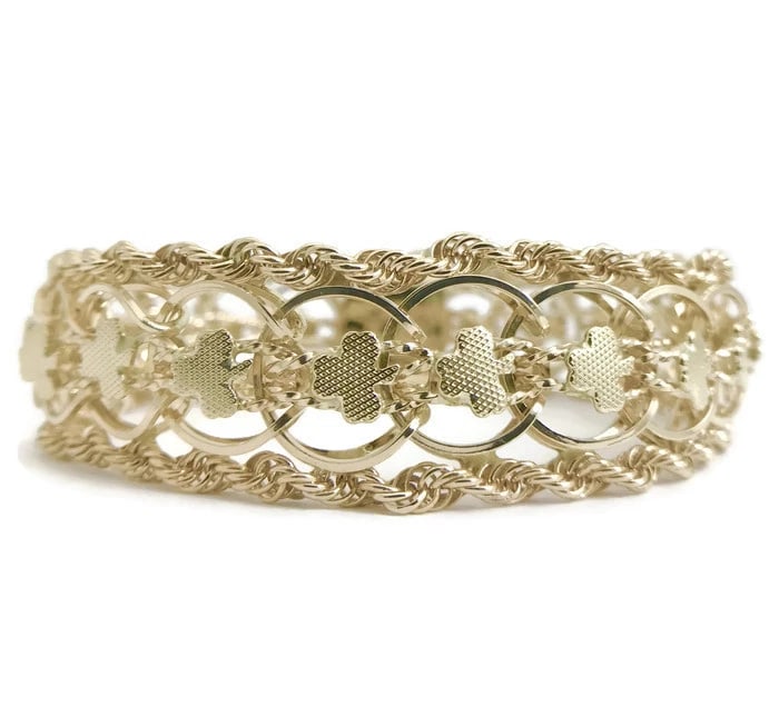 Vintage 1950's Wide Clover Rope Chain Bracelet 14K Yellow Gold, 37.14 Grams: Vintage 1950's Wide Clover Rope Chain Bracelet 14K Yellow Gold, 37.14 Grams This beautiful and unique vintage bracelet! Please let us know if you have any questions. Metal: 14K yellow gold Weight: 37.