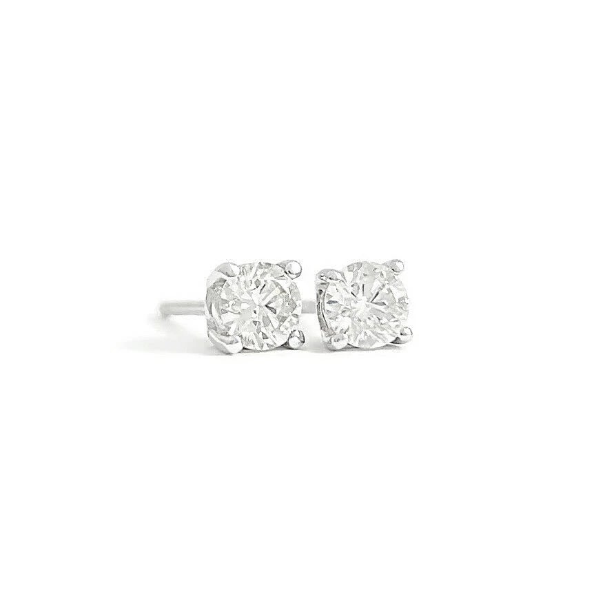 Round Diamond Stud Earrings 14K White Gold 4-Prong Basket .39 CTW: Round Diamond Stud Earrings 14K White Gold 4-Prong Basket .39 CTW These are lovely earrings! Please let us know if you have any questions. Diamonds: 2 round brilliant cuts, .39 ctw, I-J, I1 Metal: 14K