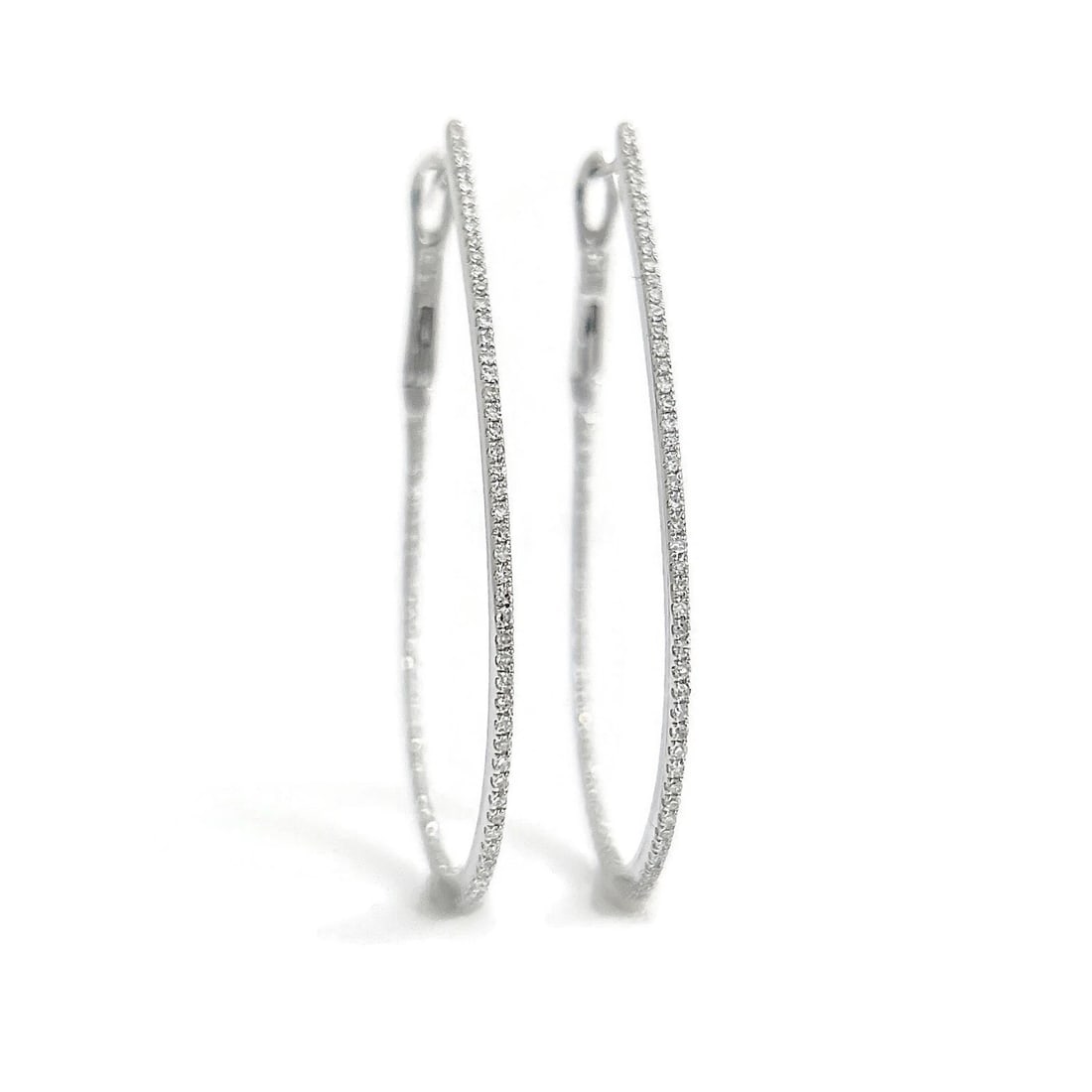 Inside-Out Thin Oblong Diamond Hoop Earrings 14K White Gold, 1.75 Inch, .78 CTW: Inside-Out Thin Oblong Diamond Hoop Earrings 14K White Gold, 1.75 Inch, .78 CTW These are beautiful hoop earrings! Please let us know if you have any questions. Diamonds: 166 round cuts, .78 ctw, F-G,