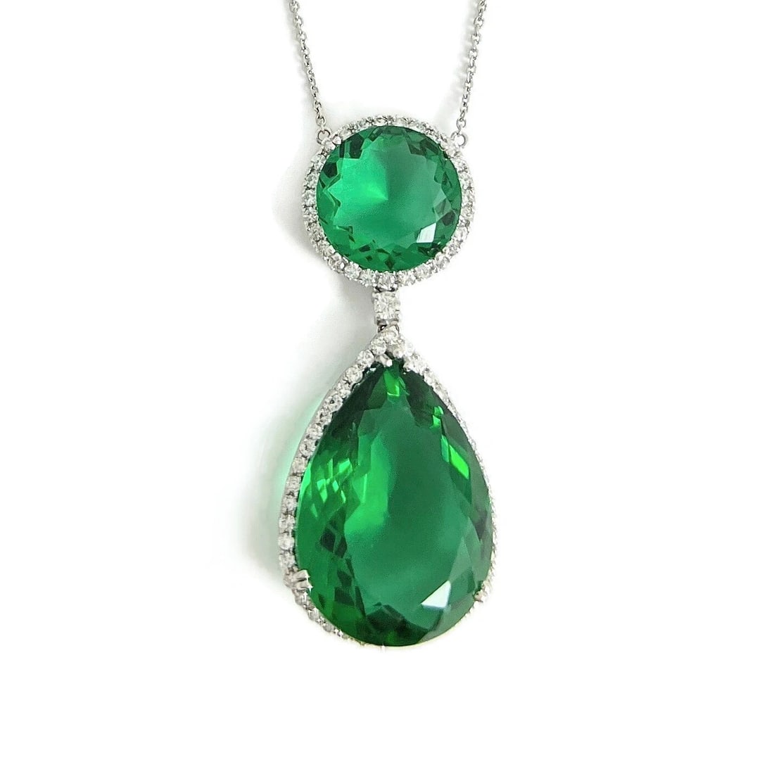 Green Topaz Diamond Halo Teardrop Pendant Necklace 14K White Gold 32.84 CTW: Green Topaz Diamond Halo Teardrop Pendant Necklace 14K White Gold 32.84 CTW This is a beautiful and stunning necklace. Please let us know if you have any questions. Gemstones: 1 round green topaz and