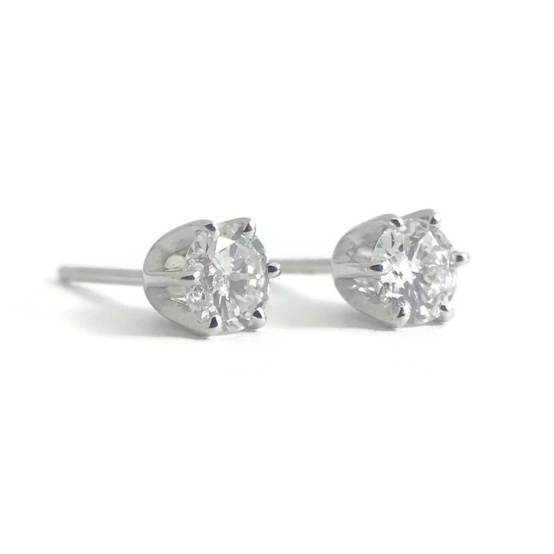 Round Diamond Stud Earrings 14K White Gold 6-Prong Crown, .50 CTW, .76 Grams: Round Diamond Stud Earrings 14K White Gold 6-Prong Crown, .50 CTW, .76 Grams These are beautiful earrings that will look great on any ears. Please feel free to make an offer. Let us know if you have a