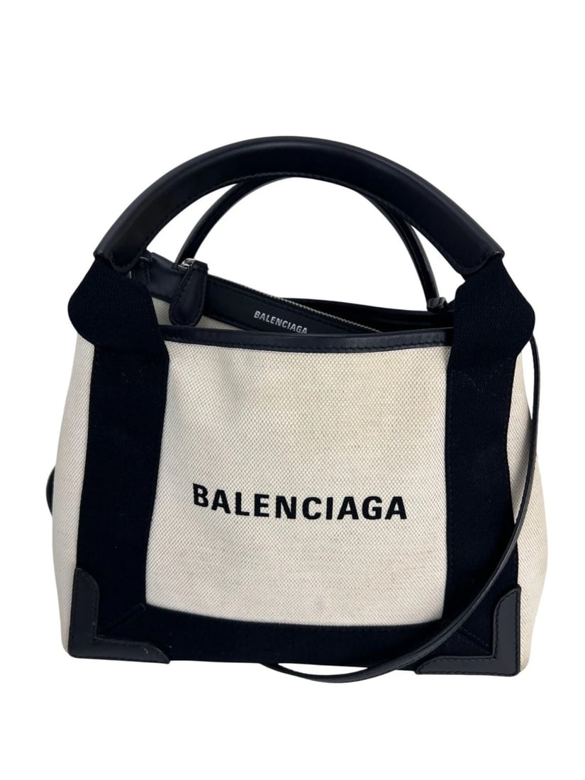 Balenciaga Cotton Canvas Calfskin Navy Cabas XS Natural Black Tote Bag: Title: Balenciaga Cotton Canvas Calfskin Navy Cabas XS Natural Black Tote Bag Description: Pre-Owned 100% Authentic Balenciaga Cotton Canvas Calfskin Navy Cabas XS Natural Black Tote Bag RATING: