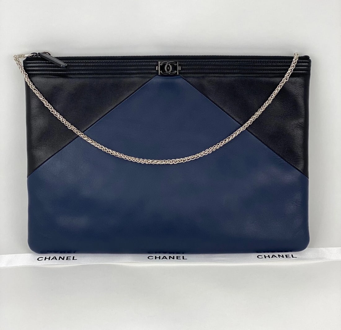Chanel Bag Quilted Lambskin Leather Blue Large Boy Zip Pouch: Title: Chanel Bag Quilted Lambskin Leather Blue Large Boy Zip Pouch Description: Pre-Owned 100% Authentic Chanel Lambskin Quilted Large Boy Zip Pouch W/Added Chain to wear as crossbody or shoulder bag
