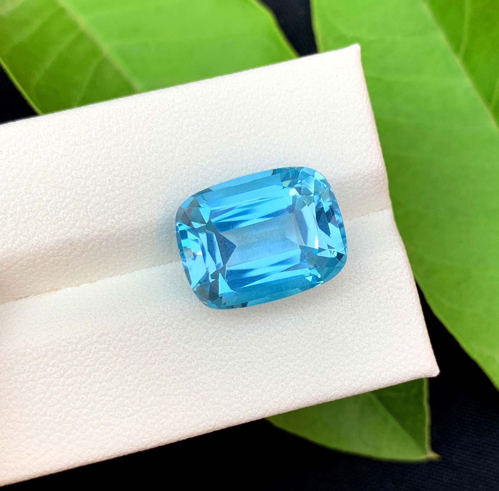 Natural Swiss Blue Topaz Gemstone: 12.95 Carat Cushion Cut: Title: Natural Swiss Blue Topaz Gemstone: 12.95 Carat Cushion Cut Description: Gemstone: Topaz Carat weight: 12.95 Natural Blue Topaz Gemstone Electric Blue Color Swiss Topaz Loose Gemstone