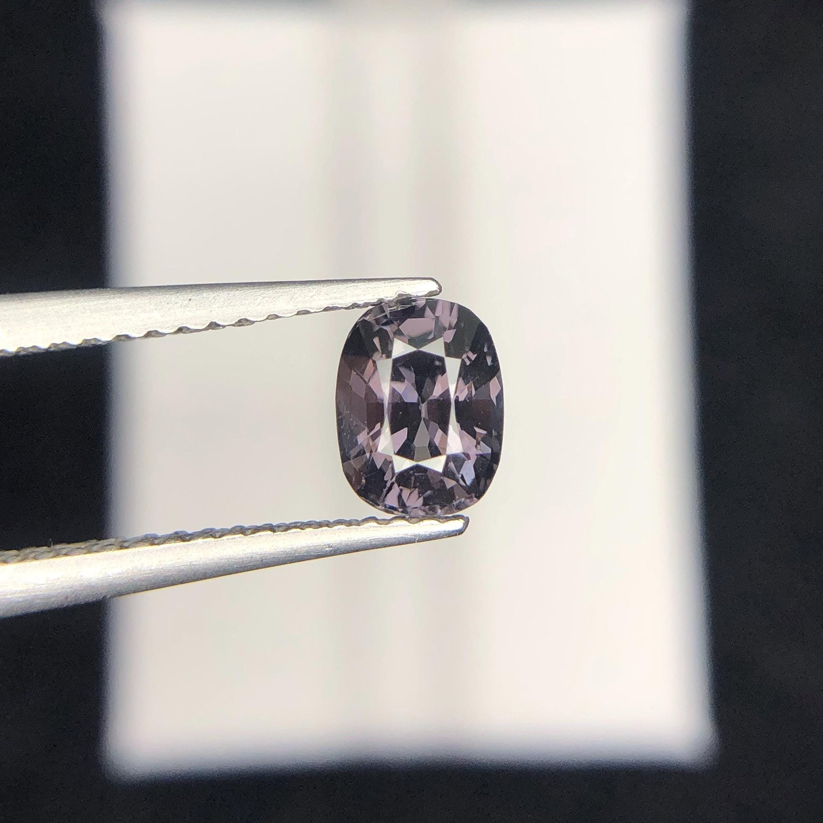 Falcon Grey Spinel: 0.87 Carat Cushion Cut Gemstone: Title: Falcon Grey Spinel: 0.87 Carat Cushion Cut Gemstone Description: Item details Highlights Handpicked by GemsAndJewelsUSA Supplies for making crafts Gemstone: Spinel Carat weight: 0.850 