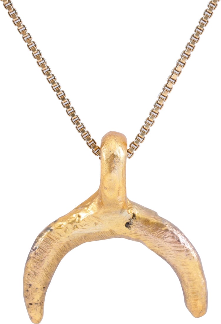 RARE VIKING LUNAR PENDANT, 9th-10th CENTURY: Just under ¾” (0.73”)" width. As expert navigators, the constellations signified mystery and power to Vikings. The Moon was personified as Mani, brother to Sol the Sun, and is abundantly