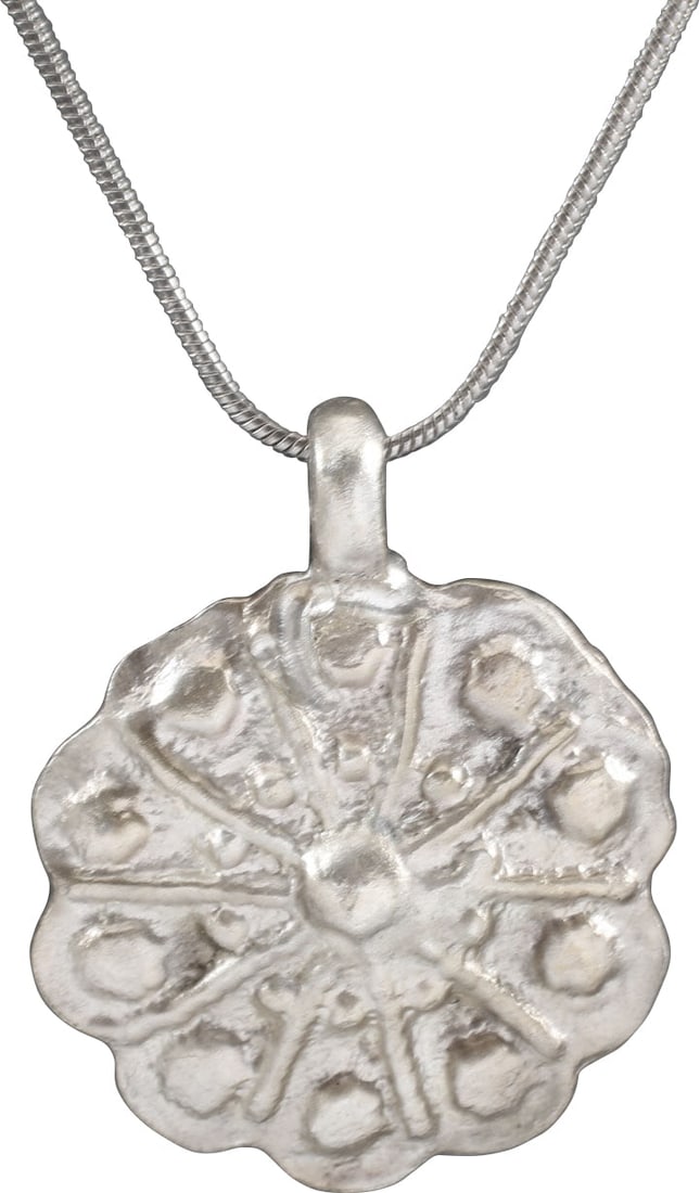 ROMAN WHEEL OF FORTUNE AMULET NECKLACE, 3RD-6TH CENTURY AD: The Wheel of Fortune (Rota Fortuna) is one of the most enduring of ancient philosophical or religious concepts. It was pivotal in Ancient Greek and Roman Paganism and smoothly transitioned into