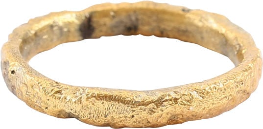 ANCIENT VIKING WEDDING RING, SIZE 5 1/2: Late 9th-early 11th century. Gilt bronze, size 5 1/2. Medium width band 2.8mm, with low rounded face. Vikings exchanged rings on the pommel of the groom's sword. Professionally refurbished with the 24