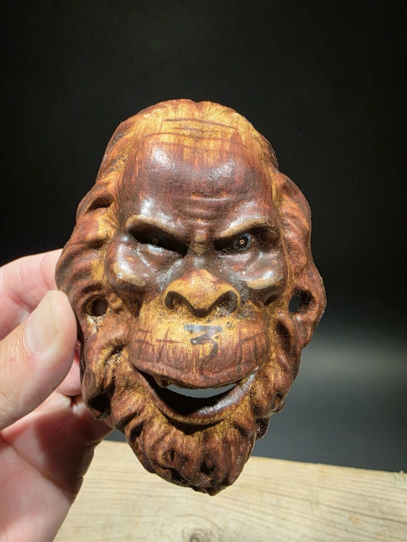 Cast Iron folk art Sasquatch Wall mount Bottle Opener: 4 3/4" Tall x 3 1/4" Wide This cast iron bottle opener is a reproduction made to resemble an early 20th-century folk art piece. Measuring 4 ¾" tall by 3 ¼" wide, it’s wall-mountable an