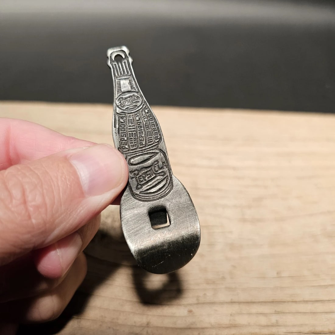 Metal Pepsi Bottle Opener: 2 3/4" Long Nice reproduction Pepsi cola bottle opener silver pewter color likely steel. Great for a key chain or as a collectible. Hard to tell its age! Reserve: $15.00 Shipping: Domestic: Flat