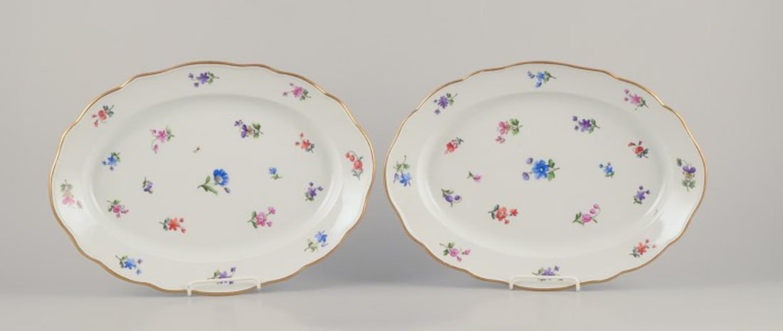 Meissen, Germany. Two oval serving platters in porcelain with polychrome floral motifs. Approx. from: Title: Meissen, Germany. Two oval serving platters in porcelain with polychrome floral motifs. Approx. from 1900. Description: Meissen, Germany. Two oval serving platters in porcelain. Hand-painted wi