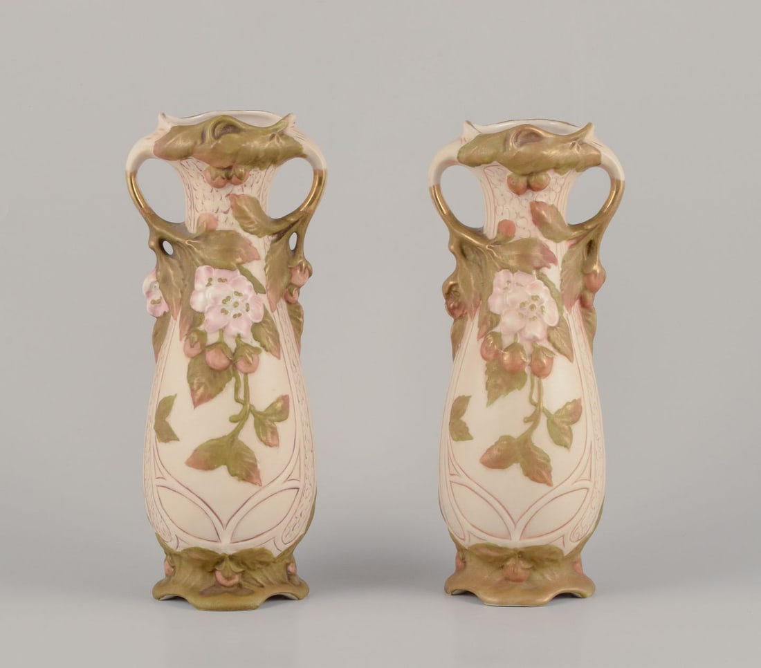 Royal Dux, Czech Republic. Pair of Art Nouveau vases in porcelain with floral relief. Approx. 1920s.: Title: Royal Dux, Czech Republic. Pair of Art Nouveau vases in porcelain with floral relief. Approx. 1920s. Description: Royal Dux, Czech Republic. A pair of Art Nouveau vases in porcelain. Classic am