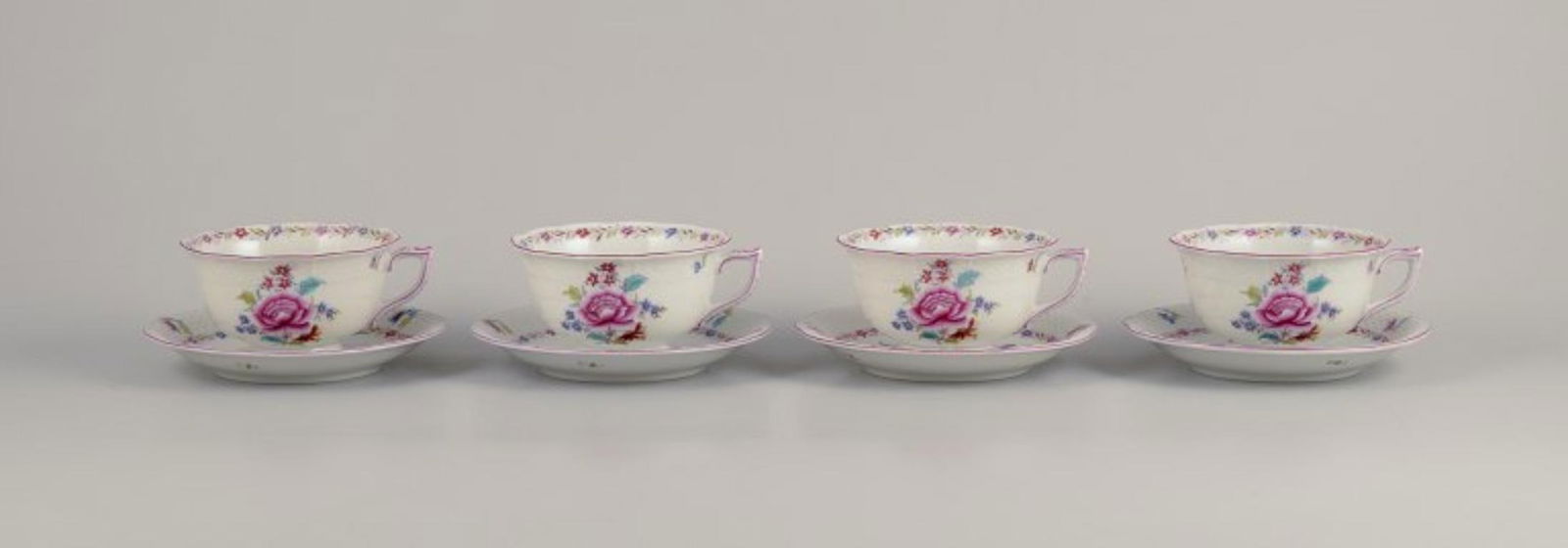 Herend, four pairs of large porcelain teacups & saucers with floral motifs. Dated 1944.: Title: Herend, four pairs of large porcelain teacups & saucers with floral motifs. Dated 1944. Description: Herend, four pairs of large porcelain teacups. Hand-painted with polychrome floral motifs. P