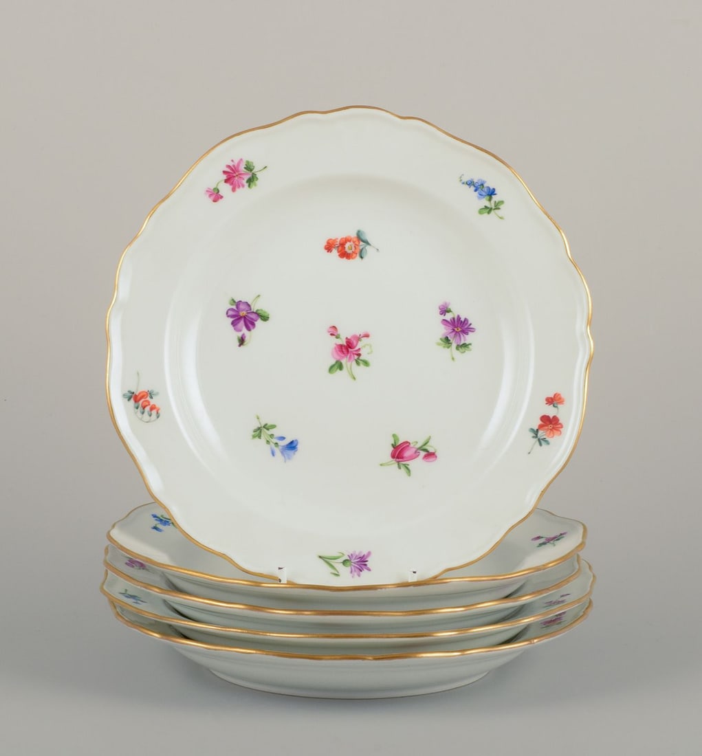 Meissen, Germany. Five porcelain plates with floral motifs, gold rim. Approx. 1920s/1930s.: Title: Meissen, Germany. Five porcelain plates with floral motifs, gold rim. Approx. 1920s/1930s. Description: Meissen, Germany. Five porcelain plates. Hand-painted with polychrome floral motifs, gold