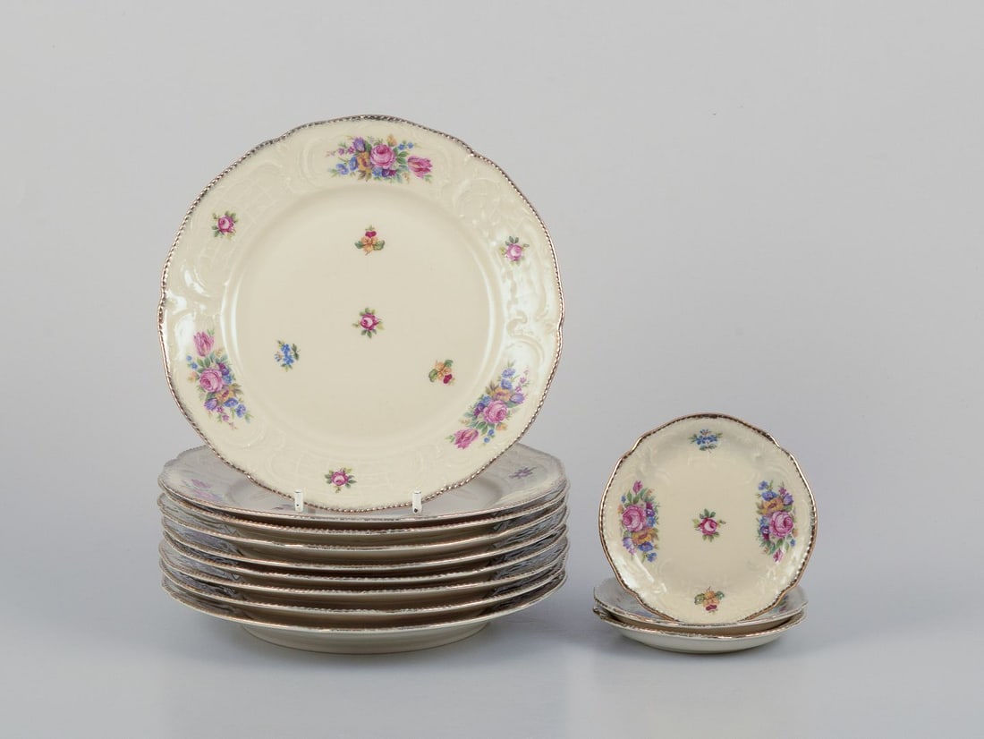 Rosenthal, "Sanssouci". Nine plates and three ashtrays with polychrome floral motifs. Approx. 1930s (1 of 5)
