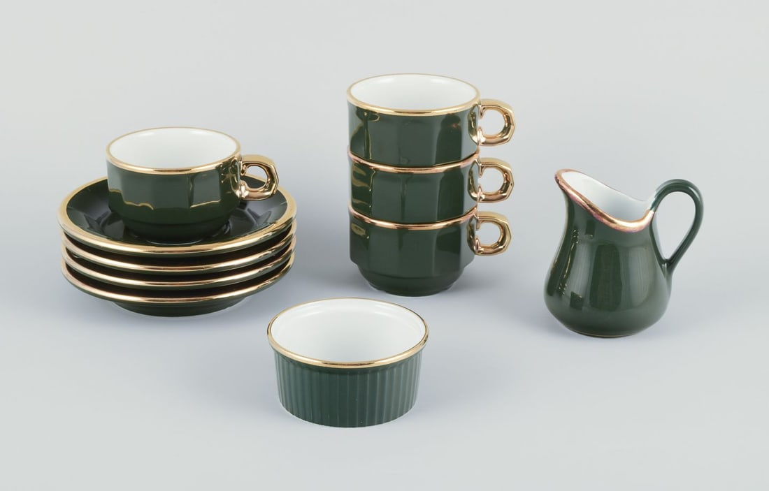 Pillivuyt, France. Four pairs of coffee cups with saucers, creamer and sugar bowl. “Green: Title: Pillivuyt, France. Four pairs of coffee cups with saucers, creamer and sugar bowl. “Green Bistro” porcelain. Ca. 1970s Description: Pillivuyt, France. Four pairs of coffee cups