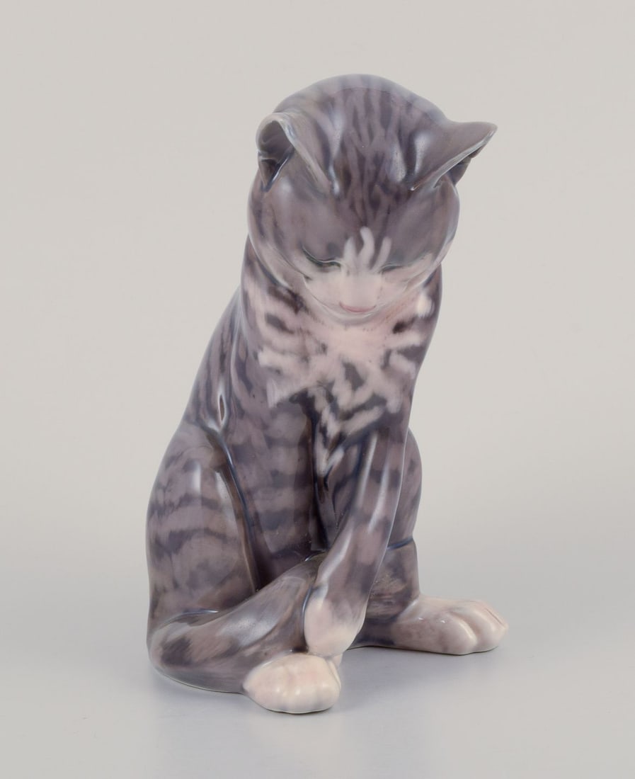 Erik Nielsen for Royal Copenhagen. Porcelain figurine of gray striped cat. Dated: 1969-1974: Title: Erik Nielsen for Royal Copenhagen. Porcelain figurine of gray striped cat. Dated: 1969-1974 Description: Erik Nielsen for Royal Copenhagen. Porcelain figurine of gray striped cat. Model number