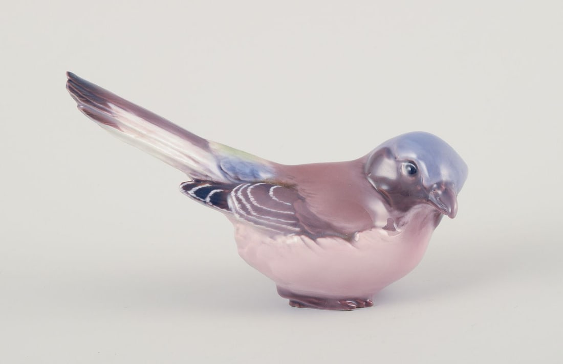 Dahl Jensen, porcelain figurine of a shrike. 1920/30s.: Title: Dahl Jensen, porcelain figurine of a shrike. 1920/30s. Description: Dahl Jensen, porcelain figurine of a shrike. Model number: 1030 Dating: 1920/30s. Marked with a royal crown and DJ