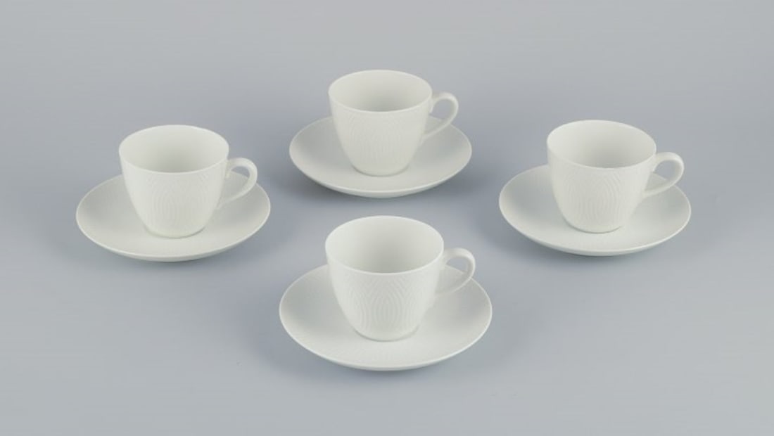 Axel Salto for Royal Copenhagen. Four pairs of coffee cups & saucers in white porcelain. (1 of 6)