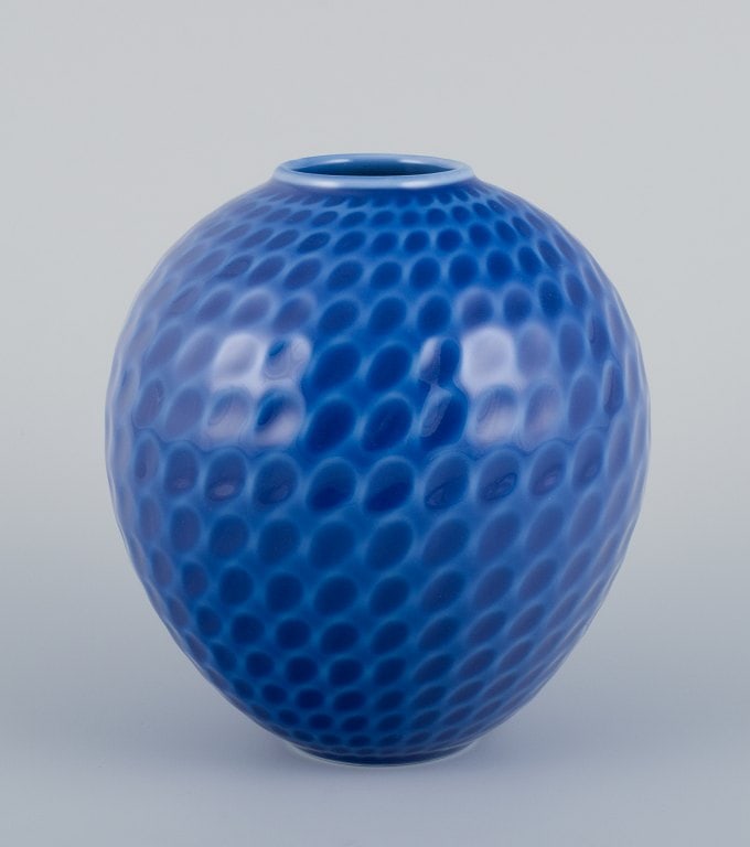 Maria Torstensson for Royal Copenhagen, porcelain vase with glaze in blue shades. Drop-shaped: Title: Maria Torstensson for Royal Copenhagen, porcelain vase with glaze in blue shades. Drop-shaped decoration. Description: Maria Torstensson for Royal Copenhagen, porcelain vase with glaze in blue