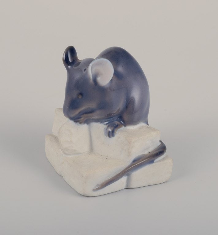 Royal Copenhagen porcelain figurine of a mouse.: Title: Royal Copenhagen porcelain figurine of a mouse. Description: Royal Copenhagen porcelain figurine of a mouse. Early 1900s. Model number: 510. In perfect condition. Marked. First factory