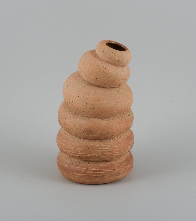 Christina Muff, Danish contemporary ceramicist (b. 1971). Tall, organically shaped vessel made from: Title: Christina Muff, Danish contemporary ceramicist (b. 1971). Tall, organically shaped vessel made from stoneware clay. Description: Christina Muff, Danish contemporary ceramicist (b. 1971). 