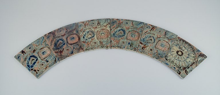 Royal Copenhagen, six Baca faience tiles with patterned glaze in brown, blue and green. (1 of 5)