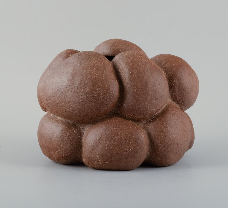 Christina Muff, Danish contemporary ceramicist (b. 1971). Golden brown unglazed stoneware clay: Title: Christina Muff, Danish contemporary ceramicist (b. 1971). Golden brown unglazed stoneware clay vessel with specks. Organically shaped. Clear glaze inside. Description: Christina Muff, Danish