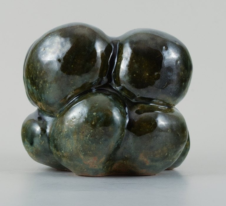 Christina Muff, Danish contemporary ceramicist (b. 1971). Organic shaped vessel glazed with shiny: Title: Christina Muff, Danish contemporary ceramicist (b. 1971). Organic shaped vessel glazed with shiny green glaze. Made from coarse, repurposed stoneware clay. Description: Christina Muff, Danish