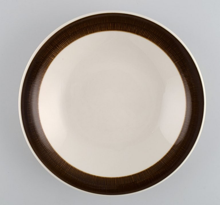 Hertha Bengtson (1917-1993) for Rörstrand. Four Koka deep plates in glazed stoneware. 1960s. - 2