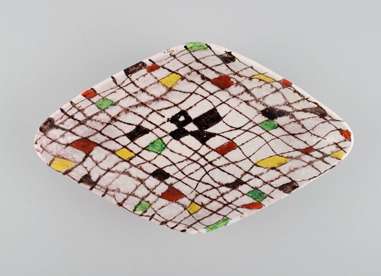 Aldo Londi for Bitossi. Mondrian dish in glazed stoneware with hand-painted checkered pattern.: Title: Aldo Londi for Bitossi. Mondrian dish in glazed stoneware with hand-painted checkered pattern. Italian design, 1960s. Description: Aldo Londi for Bitossi. Mondrian dish in glazed stoneware with