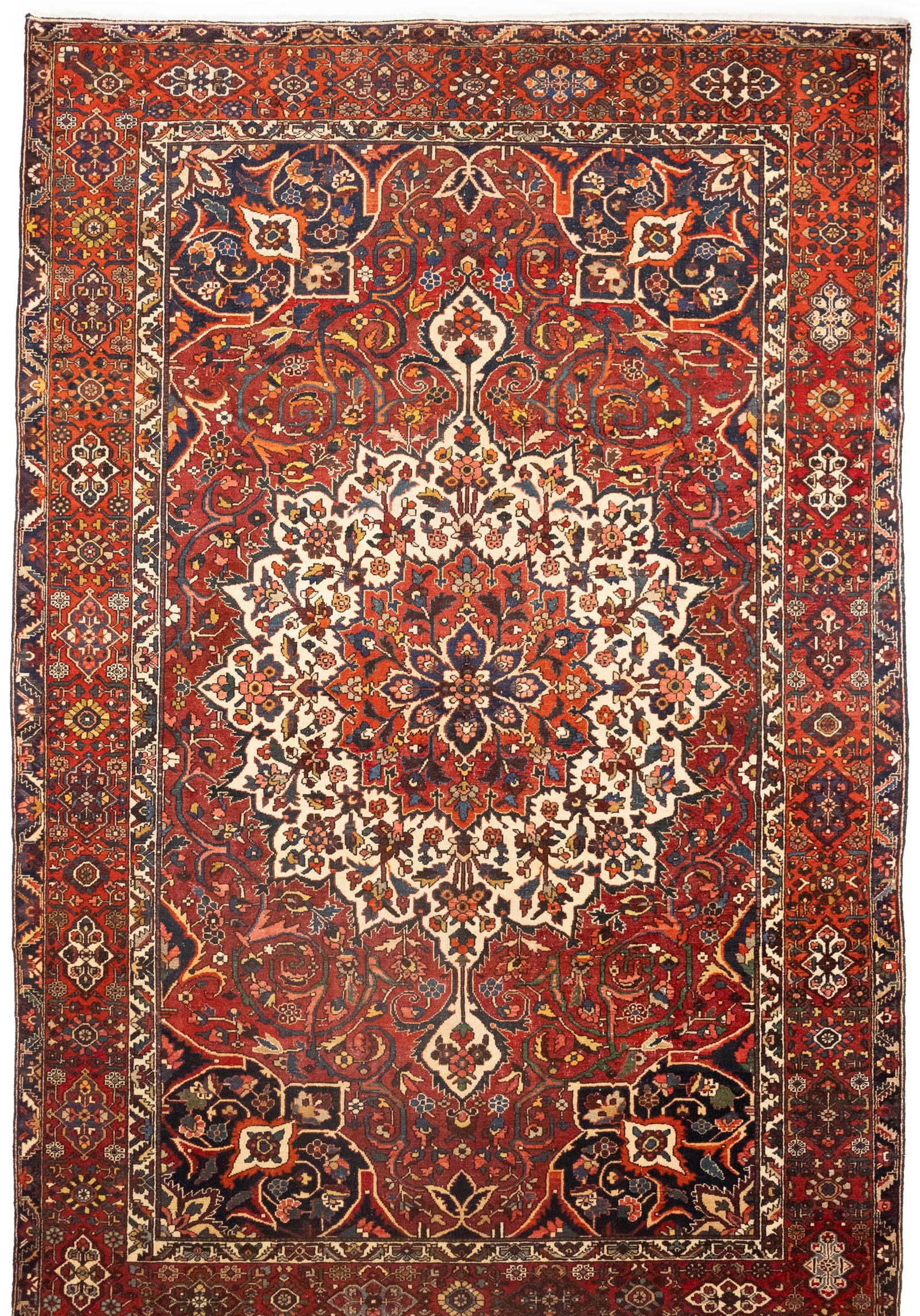 Vintage Red Floral 10X15 Bakhtiari Persian Rug: Title: Vintage Red Floral 10X15 Bakhtiari Persian Rug Description:Handmade antique 10X15 red rug made with vegetable dyes (fine wool pile and cotton foundation), superior knot c