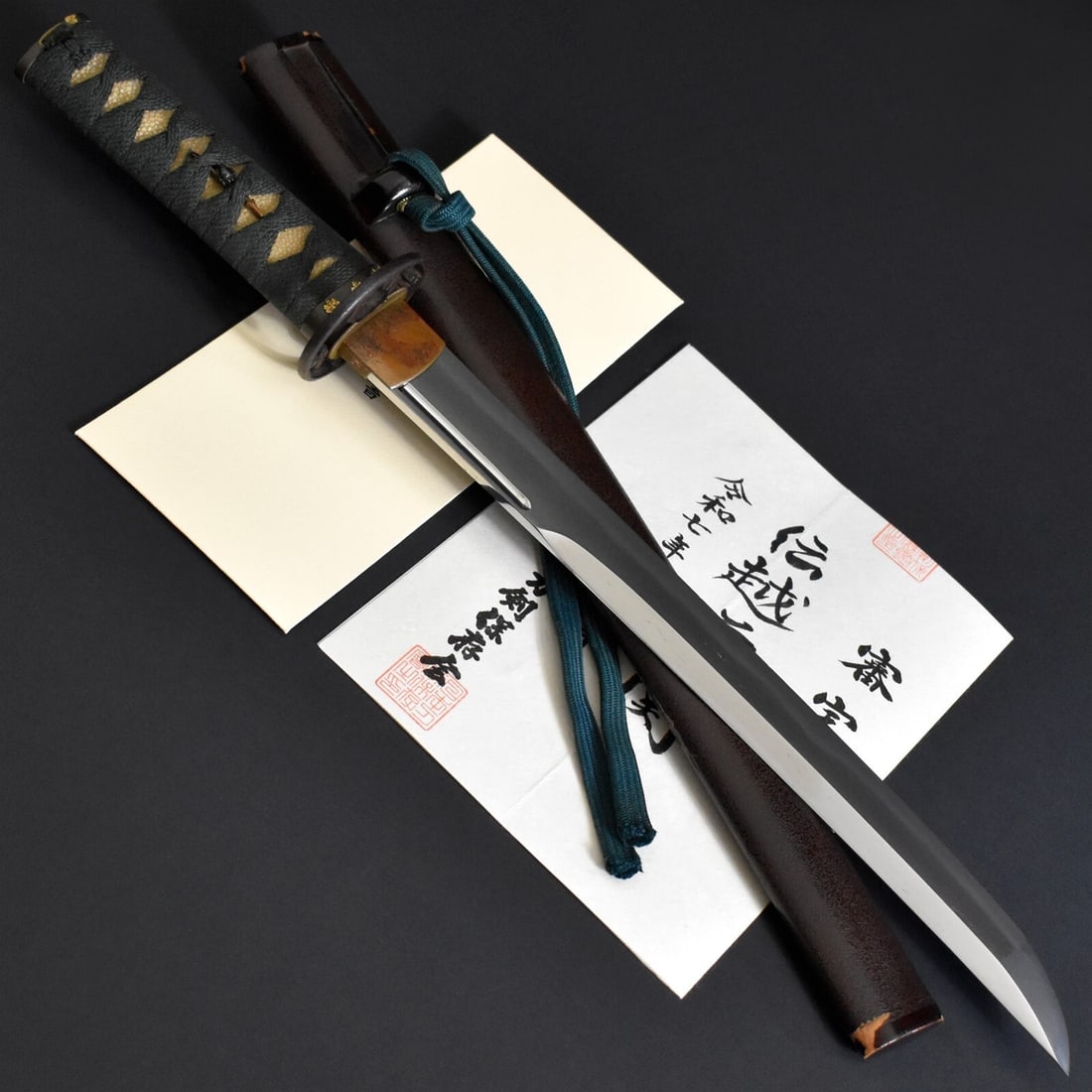 Edo Period Wakizashi Sword in Koshirae, Antique Japanese Katana Nihonto, Certified Echizen Seki: Title:Edo Period Wakizashi Sword in Koshirae, Antique Japanese Katana Nihonto, Certified Echizen Seki Description:This is an authentic antique Japanese Katana wakizashi, presented in its original kosh