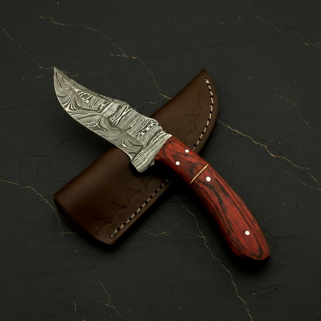 Hand Forged Damascus Steel Hunting Knife with Rosewood Handle, 8" Fixed Blade: Title:Hand Forged Damascus Steel Hunting Knife with Rosewood Handle, 8" Fixed BladeDescription:This expertly crafted hunting knife features a durable fixed blade, hand forged from 512 layers of high