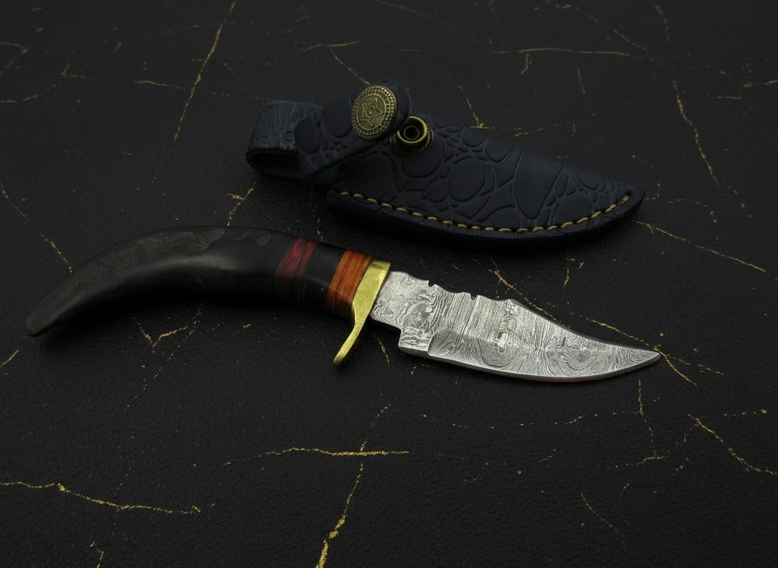 Handmade Mini Clip Point Knife in Damascus Steel, Custom Fixed Blade with Leather Sheath: Title:Handmade Mini Clip Point Knife in Damascus Steel, Custom Fixed Blade with Leather SheathDescription:This custom, handmade mini knife features a distinctive clip point blade forged from