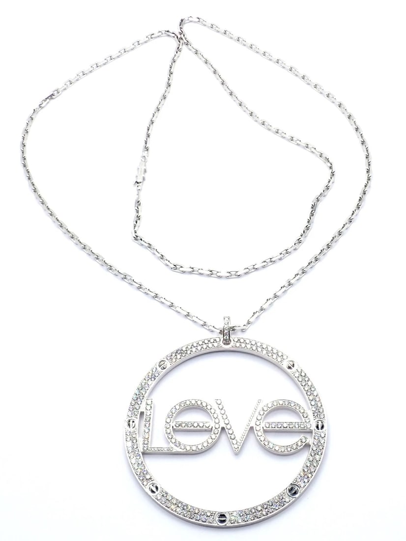 Authentic! Cartier 18k White Gold Diamond Ceramic Large Love Pendant Necklace: Authentic! Cartier 18k White Gold Diamond Ceramic Large Love Pendant Necklace About This Piece: Metal: 18k white gold Chain: Length: 31" Width: 3mm Weight: Pendant: 83 grams 2 3/4" without bail Stones