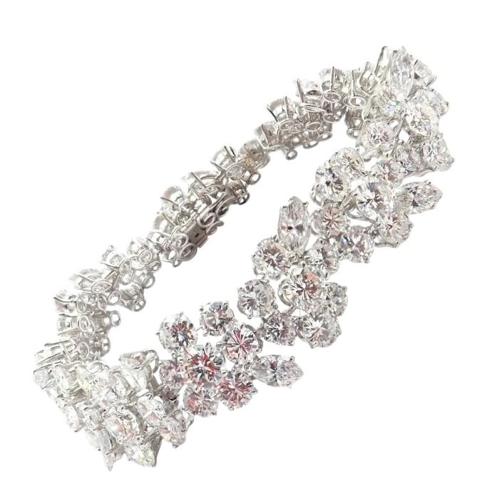 Authentic! Vintage Bvlgari Bulgari Platinum 38ct Diamond Floral Bracelet Paper: Authentic! Vintage Bvlgari Bulgari Platinum 38ct Diamond Floral Bracelet Paper About This Piece: This vintage Bvlgari bracelet is masterfully crafted in platinum and adorned with approximately 38 cara