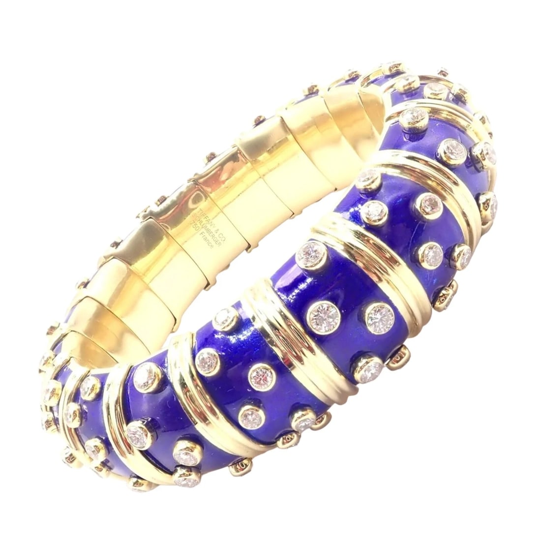 Tiffany & Co Schlumberger Dots 18k Yellow Gold Diamond Enamel Bangle Bracelet: Tiffany & Co Schlumberger Dots 18k Yellow Gold Diamond Enamel Bangle Bracelet About This Piece: The Tiffany & Co Schlumberger Dots Bangle Bracelet features 18k yellow gold adorned with round brilliant