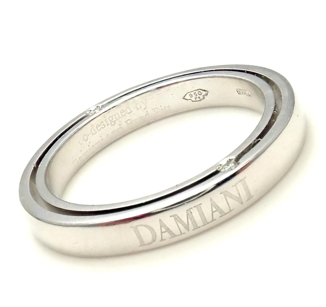 Rare! Authentic Damiani Brad Pitt Platinum 4 Diamond 3mm Band Ring Sz 7: Rare! Authentic Damiani Brad Pitt Platinum 4 Diamond 3mm Band Ring Sz 7 About This Piece: Damiani Box + Paperwork included Metal: Platinum Measurements: Weight: 7.1 grams Width: 3mm Size: 7 Stones: 4