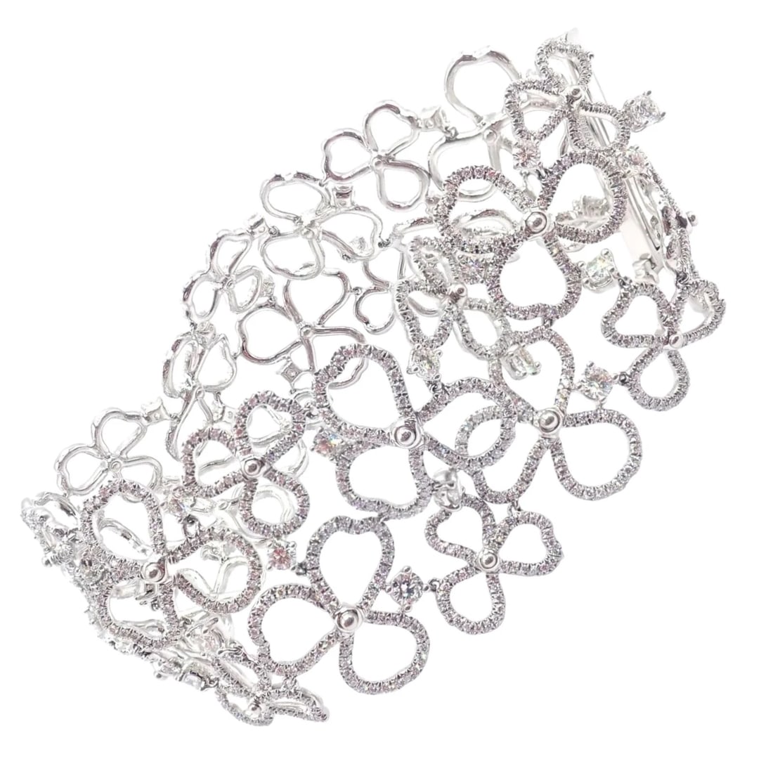 Authentic! Tiffany & Co Paper Flowers Platinum Diamond Wide Bracelet: Authentic! Tiffany & Co Paper Flowers Platinum Diamond Wide Bracelet About This Piece: The Tiffany & Co Paper Flowers Bracelet is a stunning piece crafted in platinum. It features an intricate floral