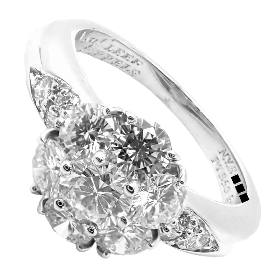 Authentic! Van Cleef & Arpels Platinum Diamond Fleurette Flower Ring: Authentic! Van Cleef & Arpels Platinum Diamond Fleurette Flower Ring About This Piece: The Van Cleef & Arpels Platinum Diamond Fleurette Flower Ring features a delicate floral motif, intricately set w