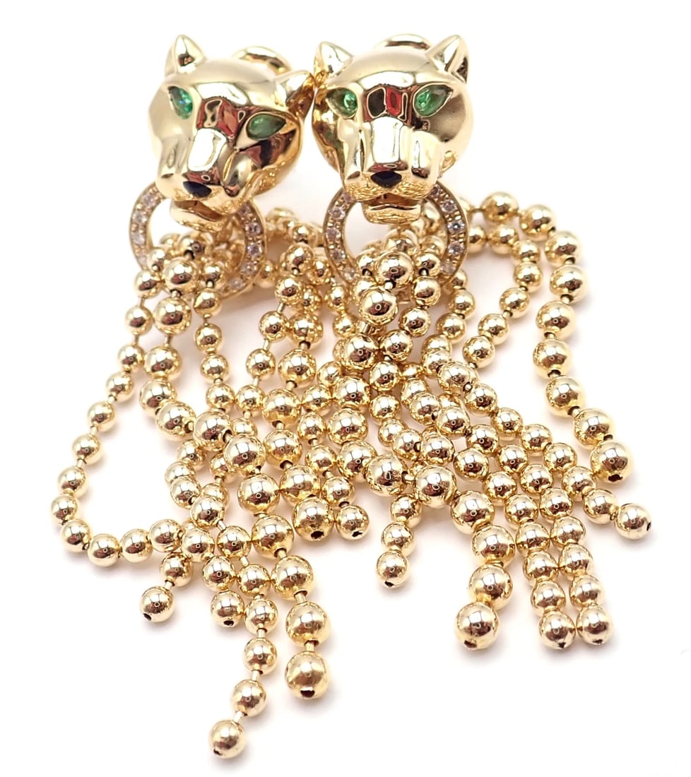 Authentic! Cartier Panther Panthere 18k Gold Diamond Tsavorite Onyx Earrings: Authentic! Cartier Panther Panthere 18k Gold Diamond Tsavorite Onyx Earrings About This Piece: The Retail Price: $24,800 Metal: 18k Yellow Gold Size: 47.43mm x 10.37mm Weight: 17.8 grams Stones: 34 Ro