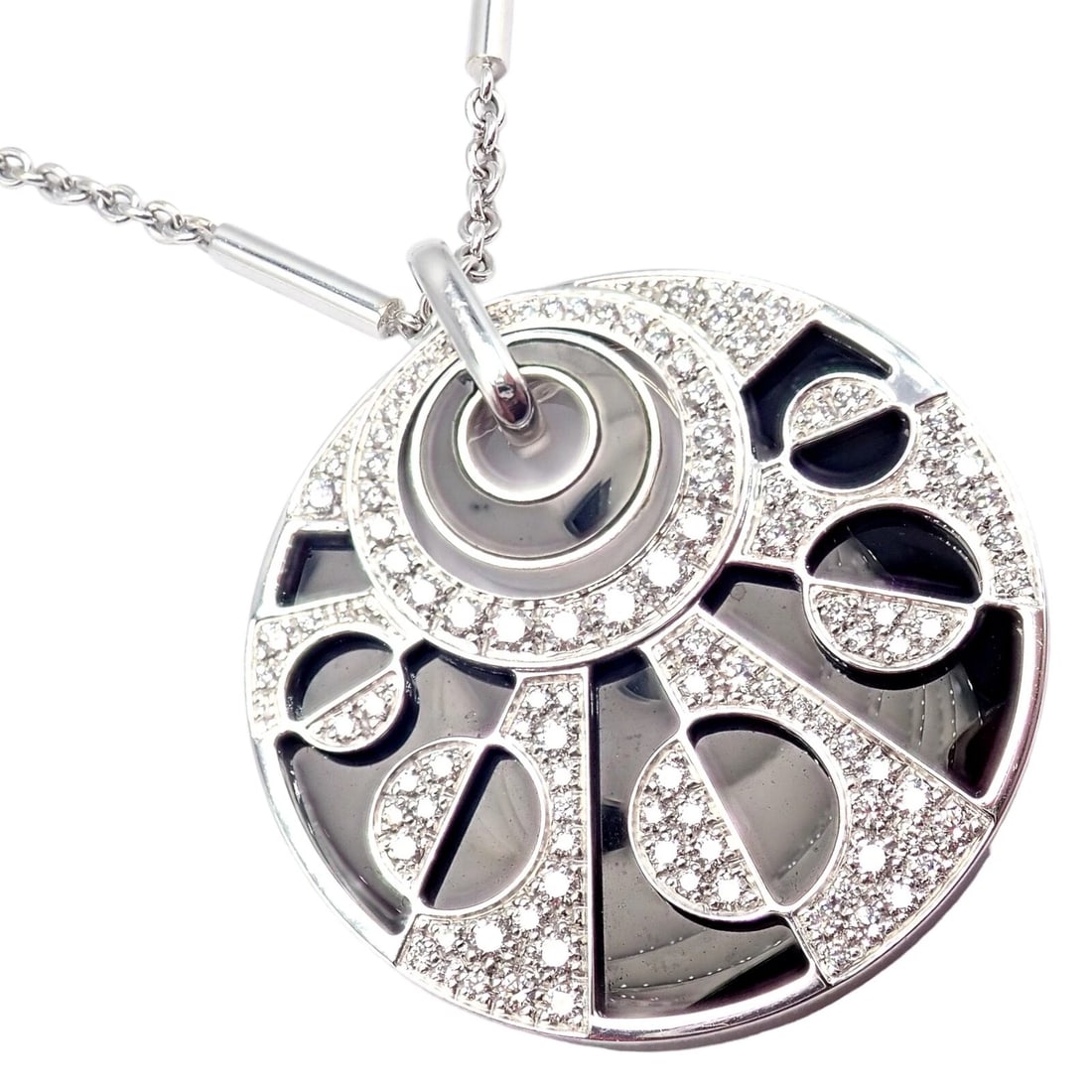 Authentic Bvlgari Bulgari Intarsio 18k White Gold 5ctw Diamond Onyx 18" Necklace: Authentic Bvlgari Bulgari Intarsio 18k White Gold 5ctw Diamond Onyx 18" Necklace About This Piece: The Authentic Bvlgari Intarsio necklace is a masterpiece of unparalleled elegance, meticulously craft