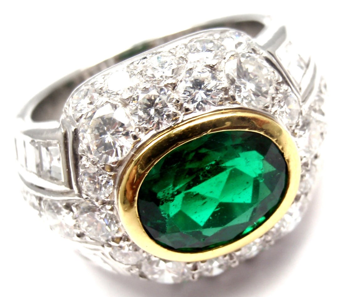 Rare! Authentic Patek Philippe Platinum Diamond Emerald Ring Certificate: Rare! Authentic Patek Philippe Platinum Diamond Emerald Ring Certificate About This Piece: This ring is AGL certified. Origin: Zambia. Metal: Platinum Size: 6 Measurements: Weight: 16.2 grams Width: 1