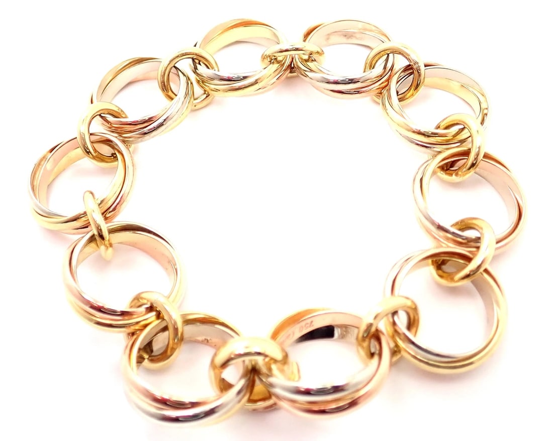 Authentic! Cartier Trinity 18k Multi Color Gold Round Wide Link Bracelet: Authentic! Cartier Trinity 18k Multi Color Gold Round Wide Link Bracelet About This Piece: About Cartier: The company has a long and distinguished history of serving royalty, as well as stars and cele