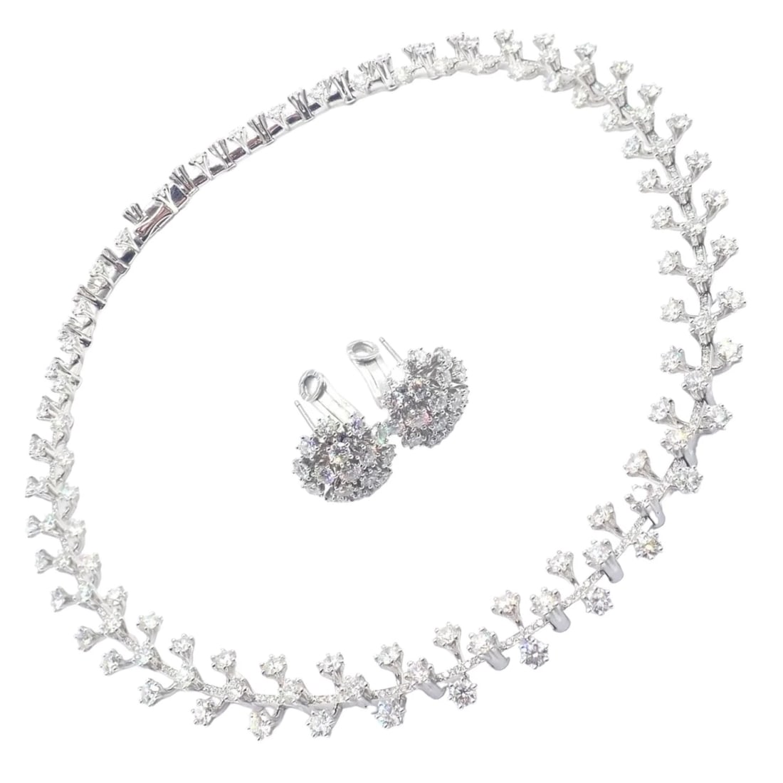 Authentic Tiffany & Co Spray Platinum Diamond Necklace Earrings Set Paper France: Authentic Tiffany & Co Spray Platinum Diamond Necklace Earrings Set Paper France About This Piece: The Tiffany & Co Spray Set, featuring a platinum necklace and earrings, is adorned with dazzling diam