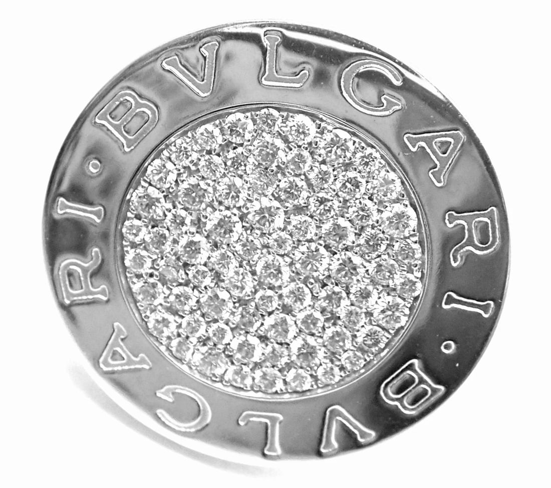 Rare! Authentic Bvlgari Bulgari 18k White Gold Diamond Ring: Rare! Authentic Bvlgari Bulgari 18k White Gold Diamond Ring About This Piece: Metal: 18k White Gold Size: 6 Weight: Width: 16.3 grams 25mm Stones: 73 round brilliant cut diamonds VS1 clarity, G color