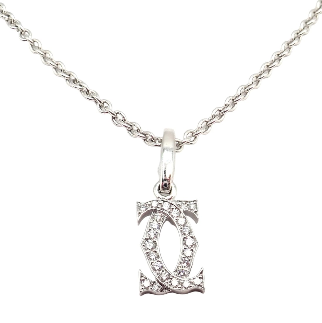 Authentic! Cartier Double C 18k White Gold Diamond Pendant Necklace: Authentic! Cartier Double C 18k White Gold Diamond Pendant Necklace About This Piece: Authentic Cartier Double C pendant, exquisitely set in 18k white gold and adorned with sparkling diamonds. This ne
