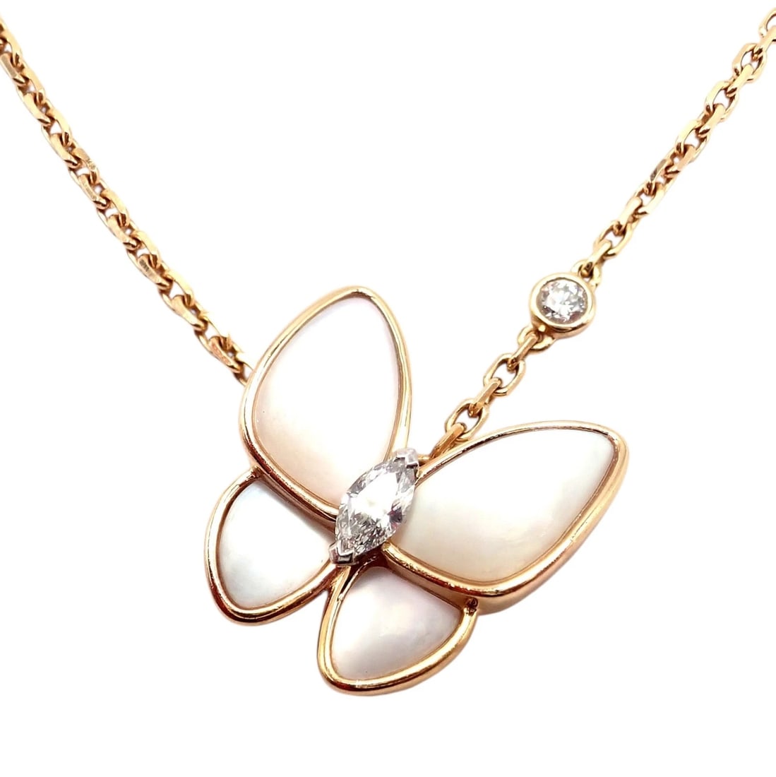 Van Cleef & Arpels 18k Rose Gold Diamond MoP Two Butterfly Pendant Necklace Cert: Van Cleef & Arpels 18k Rose Gold Diamond MoP Two Butterfly Pendant Necklace Cert About This Piece: The Van Cleef & Arpels Two Butterfly Pendant Necklace showcases elegant beauty with 18k rose gold, sh